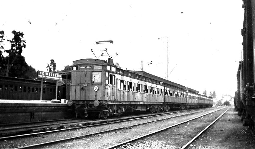 Red swing-door electric train, Heidelberg Station, circa 1935.