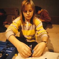 Digital Photograph -  Debbie Programming LEGO, Sunrise School, Melbourne Museum, Russell Street, 1989