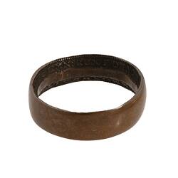 Wedding band made from a penny coin. Inscriptions on inside of band.