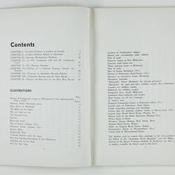 Open booklet with white pages and black printing.