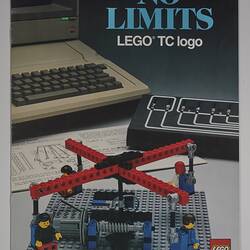 Front cover with red LEGO carousel build at front with four figures. Computer behind. Text above.