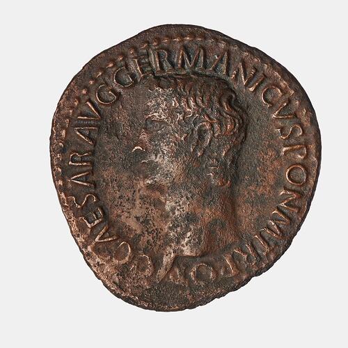 Irregular roin coin with male bust facing left. Text around.