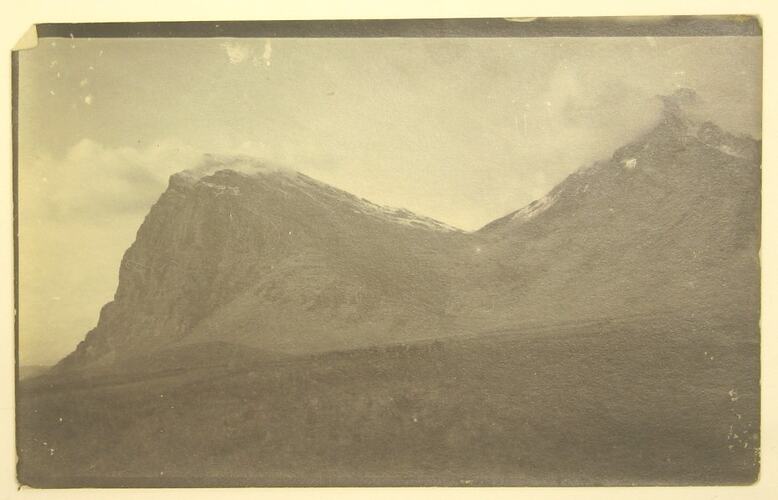 Mountain landscape with plains in foreground.