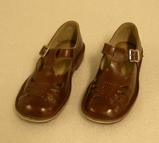 Brown leather school shoes.