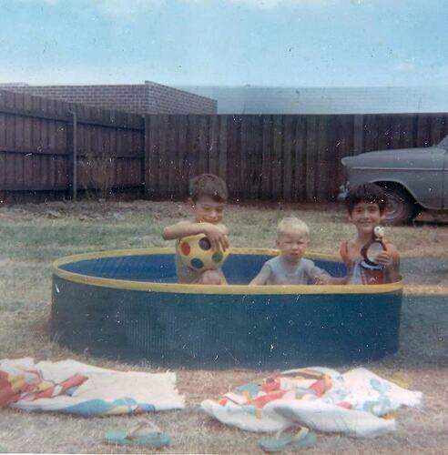 Digital Photograph - Two Boys & a Girl in Wading Pool in Bare Backyard, Gladstone Park, 1972