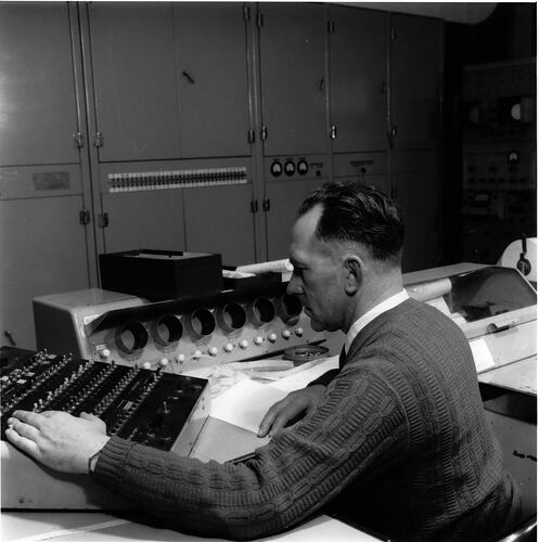 Roy Muncey at console using switch panel