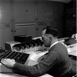 Photographs - CSIRAC Computer, Roy Muncey at Console Using Switch Panel, 1960