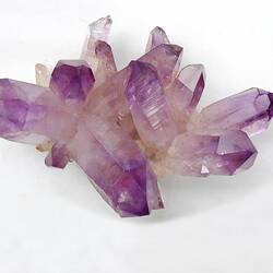 Pink-purple crystal specimen.