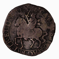 Coin, round, within a circle of beads, crowned King advancing left on horseback, holding sword.