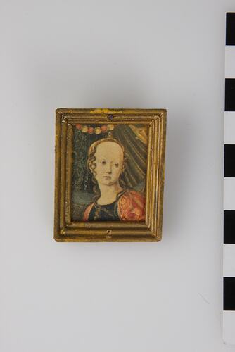 Dolls' house painting of a girl.
