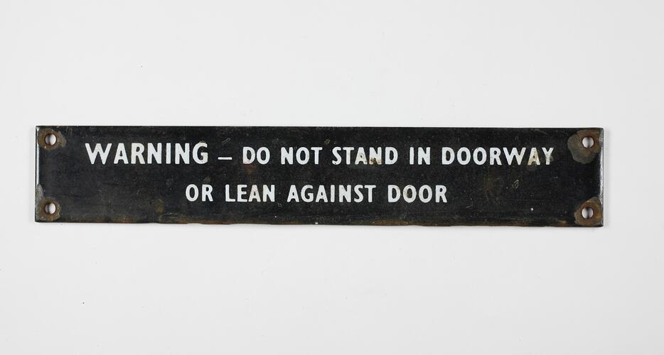 Carriage Warning Sign - 'Do Not Stand in Doorway or Lean Against Door'