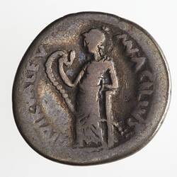 Round coin, aged, helmeted figure, holding snake and resting arm against column.