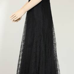 Side view, black, lace, floor length, floral dress.