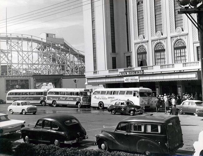Buses parked outside Palais Theatre.