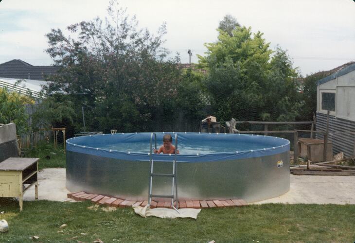 Digital Photograph - Child Swimming in Woods' Family Back Yard Pool, Lalor, 1975