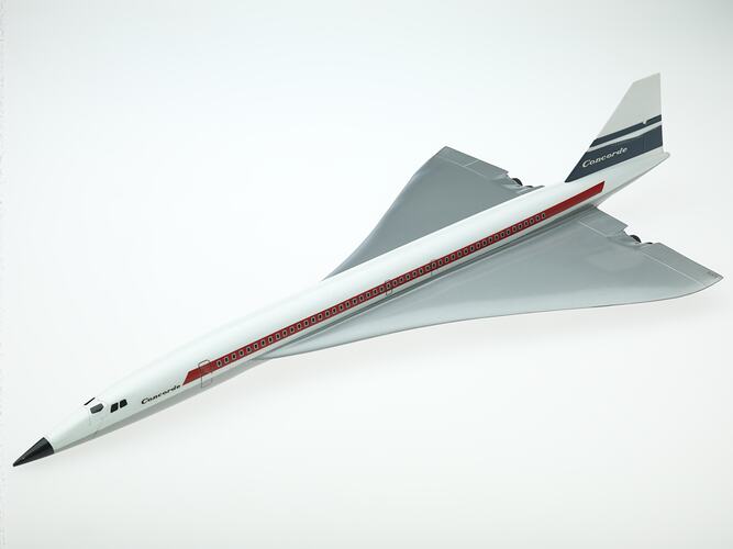 Plastic Concorde plane model with white body and silver wings.
