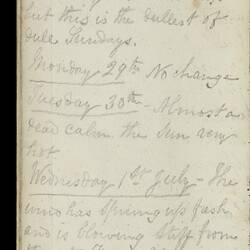 Open diary with handwritten text on discoloured worn page.
