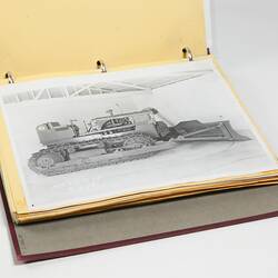 Photograph Album of harvesting equipment.