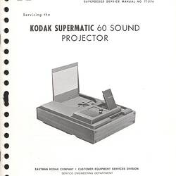 Cover page with text and photograph of projector.