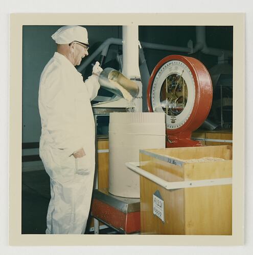 Slide 131, Worker Weighing Gelatine, Kodak Factory, Coburg, 'Extra Prints of Coburg Lecture' album, circa 1960s