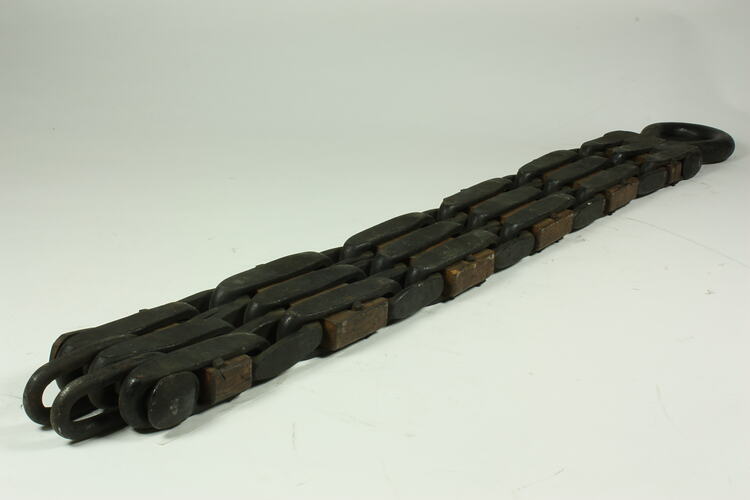 Metal chain with square links.