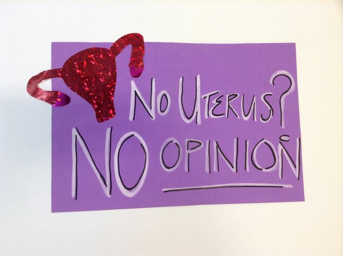 Purple poster with black and white text. Red uterus top left corner.