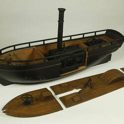 Wooden paddle steamer model, with deck removed.