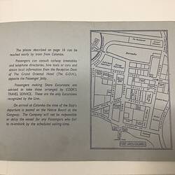 Inside of back cover of pale blue booklet. Blue printed text at left and map of Colombo city at right.
