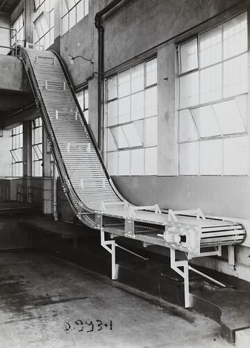 Room with steep conveyor belt.