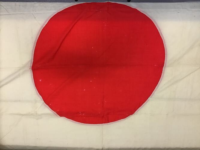 Red circle, white background.