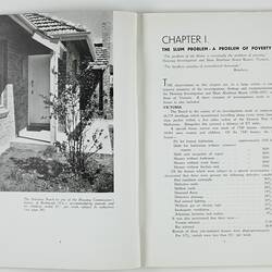 Open booklet with white pages and black printing. House on left page.