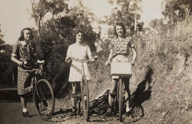 Digital Photograph - Three Girls Riding their Bikes to Ferntree Gully, 1940