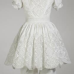 White cotton broderie anglaise child's dress.