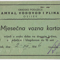 A green tram ticket written in Croatian.