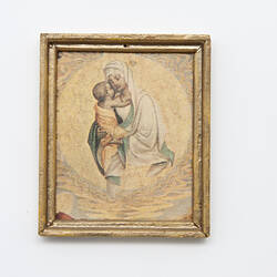 Framed religious image of mother and child.