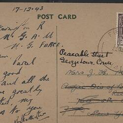 Postcard on off-white cardstock with handwritten text, stamp in top-right corner.