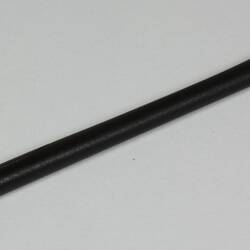 Black plastic computer stylus.