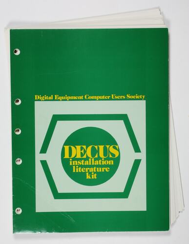 Green and white booklet cover with yellow printing.