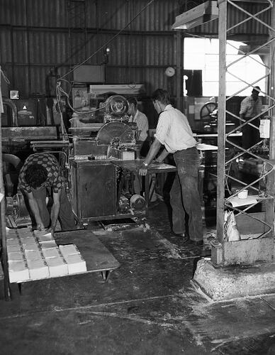 Monochrome photograph of a printing factory.