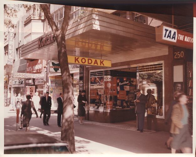Footpath in front of Kodak shop.