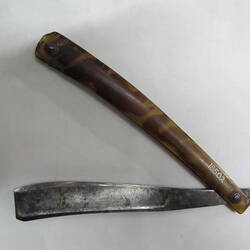 Cut-throat razor, open
