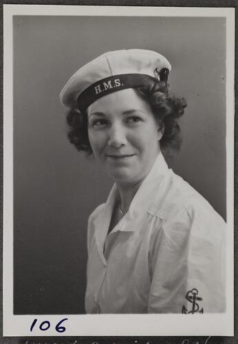 Studio portrait of woman in military uniform.
