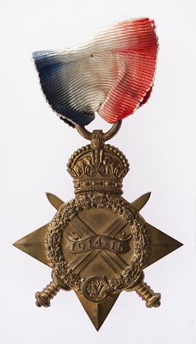 Front of bronze four point star medal 'ensigned' by a crown. Red, white and blue ribbon.