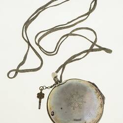 Gentleman's pocket watch in case and attached to silver plaited chain.