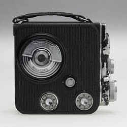 Side view of black movie camera.