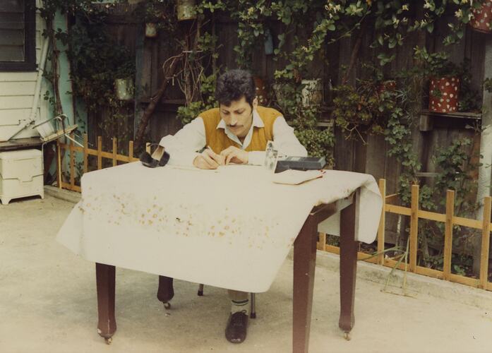 Abdul Fahour (Wafa's father) writing a letter in Carlton, 1970