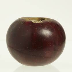 Dark red apple model. Profile.