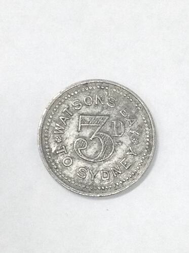 Round ferry transport token.