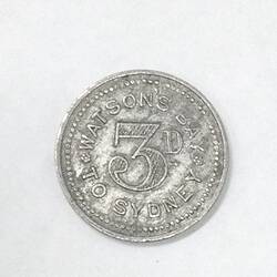 Round ferry transport token.
