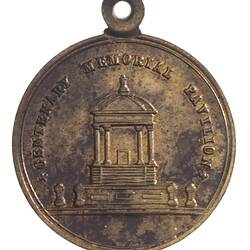 Medal with central pavilion and text around, Loop at top.